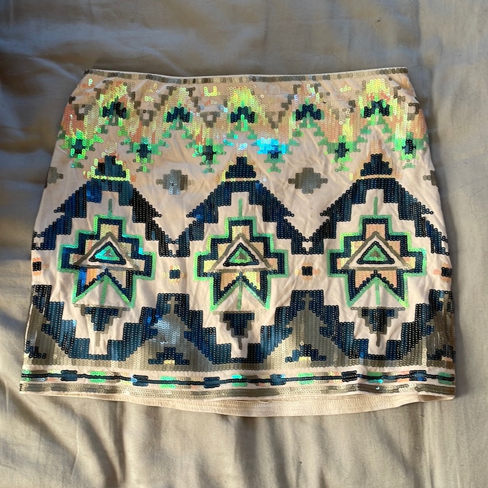 Express mini skirt. Size small. Beige with colored pattern.
